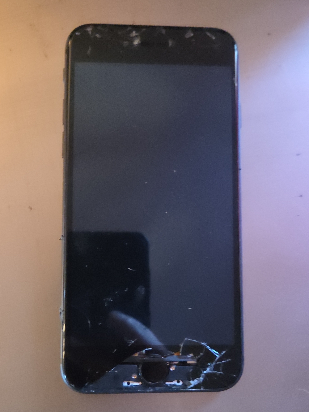 Black I Phone with Cracked Screen